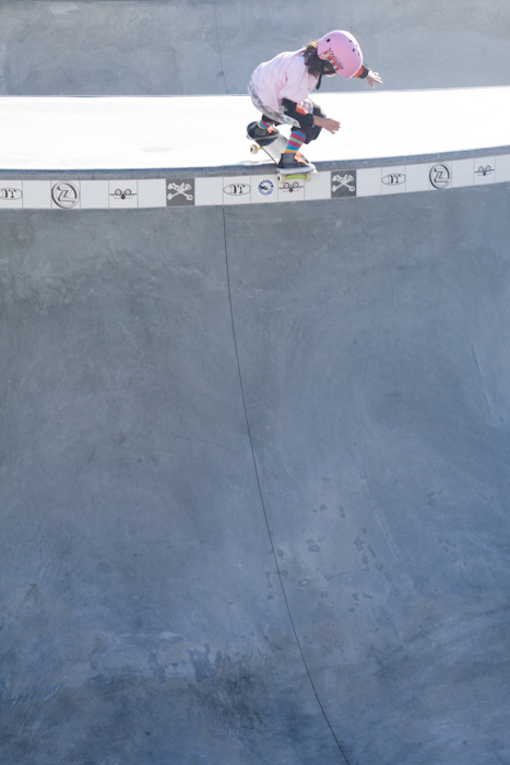 8 years old, pink helmet, 12 foot deep concrete bowl.